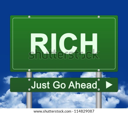 Business Concept Present By Green Rich Just Go Ahead Street Sign Against A Blue Sky Background