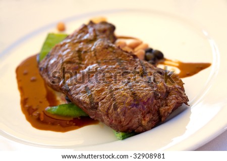 Sirloin strip Steak with green Beans ,vegetables and savory sauce