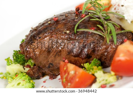 Steak dinner , Fillet Mignon- juicy grilled, pepper steak