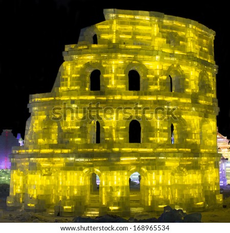 HARBIN, PEOPLE\'S REPUBLIC OF CHINA - DECEMBER 27: Ice Sculpture of the Coliseum at the 2014 Harbin Snow and Ice Festival shown on December 27, 2013 in Harbin, People\'s Republic of China.