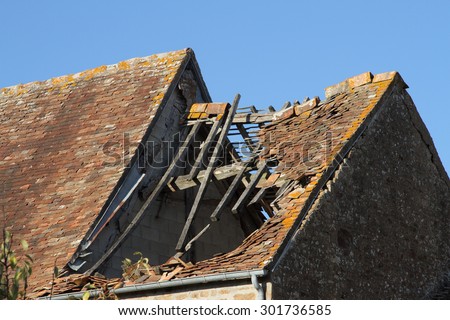 Tile Roof damaged and needing repair