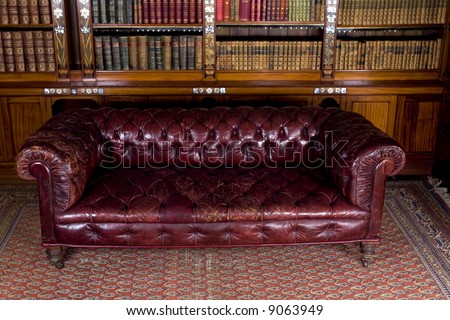 Retro brown leather couch in reading room
