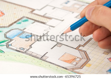 Architect draws a home plan