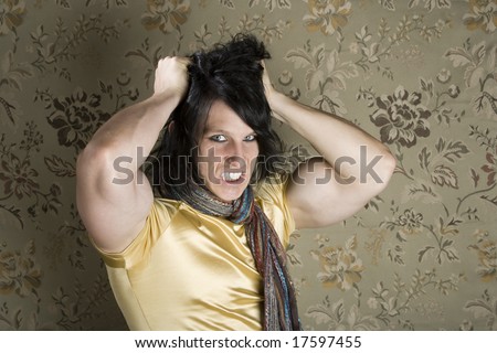 Frustrated Muscular Young Man Pulling Out His Black hair