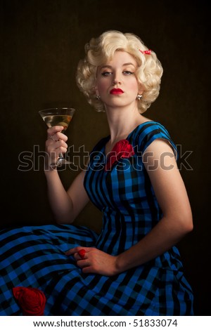 stock photo pretty retro blonde woman in vintage s dress with martini 51833074