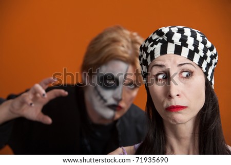 Woman is stalked by another in scary makeup