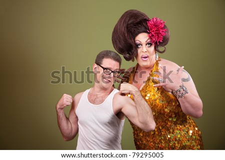 Short muscular man with impressed heavy-set drag queen