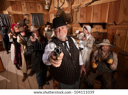 Serious Man With Old West Gang Holding Guns Stock Photo 104111039 ...