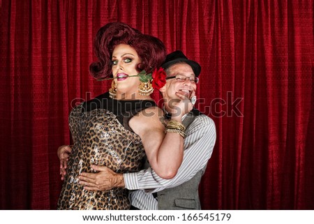 Happy man in drag with smiling businessman