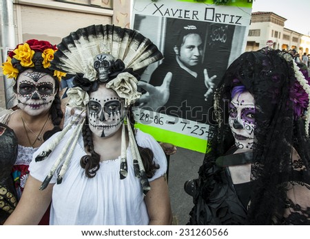 TUCSON, AZ/USA - NOVEMBER 09: Three undientified women at the All Souls Procession on November 09, 2014 in Tucson, AZ, USA.