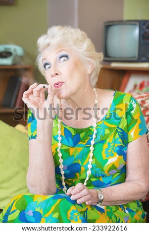 Senior lady high from smoking weed in 1960s scene