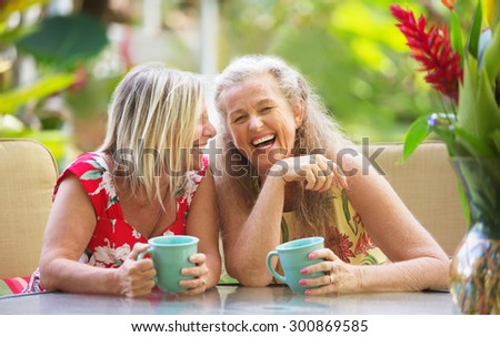Pair of cute middle aged female friends laughing ストックフォト © 
