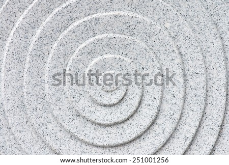 Circle wave relief on granite stone