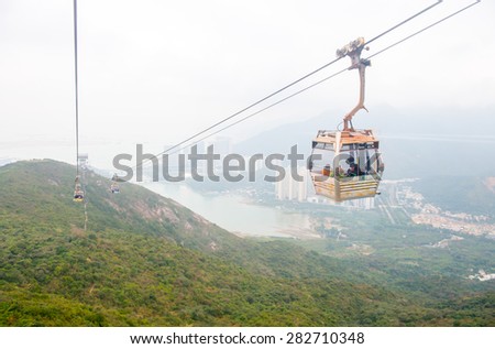 HONG KONG - FEBRUARY 07 : cable car ride to Lantau Island in Hong Kong on February 07 2015. Lantau is the largest island in Hong Kong, located at the mouth of the Pearl River.