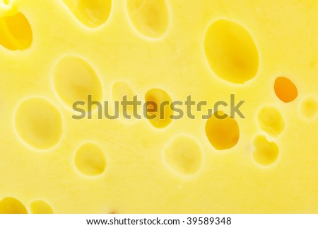 Background image of a large block of cheese