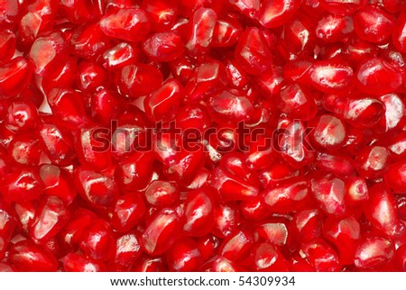 peeled ripe seeds pomegranate background