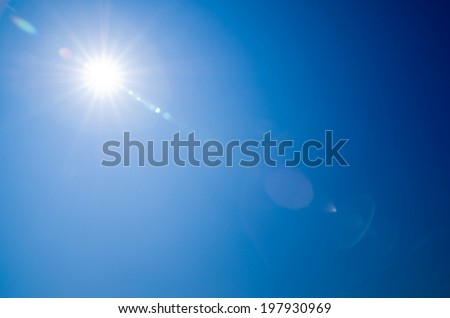 Shining sun at clear blue sky
