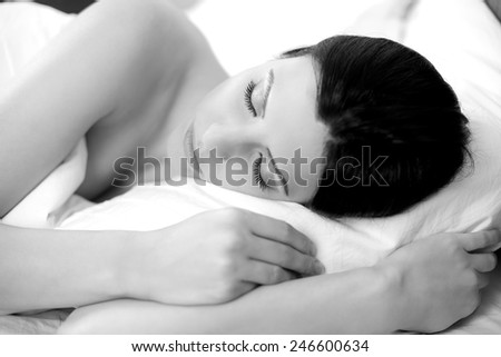 black and white closeup of beautiful woman having good sleep