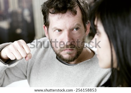 Angry man willing to hit wife in face