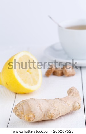 Green tea with ginger, lemon and brown sugar.