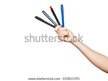 woman\'s hand with four pens isolated on white background