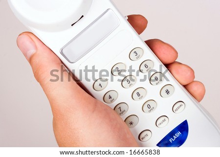 An image of telephone in mans hand