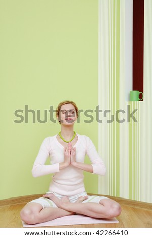 An image of a girl in the pose of lotus