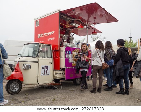 BOLOGNA, ITALY - April 25, 2015: The traditional Italian cuisine on the road. Food served by small trucks around the streets.