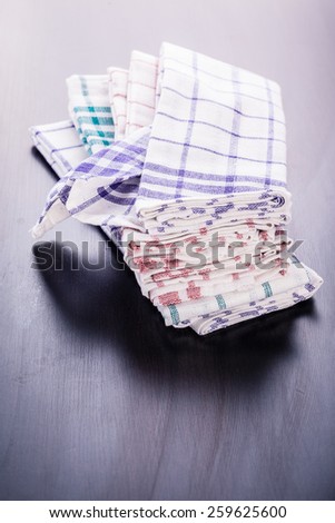 a stack of kitchen dish cloth or canvas in various colors