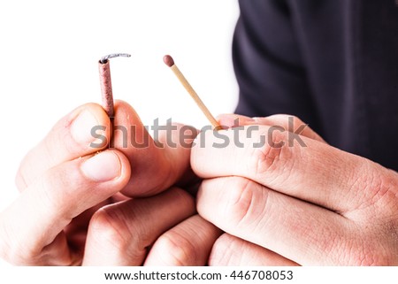 stock-photo-a-young-and-handsome-businessman-with-a-tiny-red-firecracker-446708053.jpg
