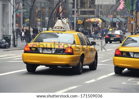 NEW YORK, USA - MARCH 18: Taxis in the traffic, Manhattan, March 18, 2012 in New York City. The city is planning to replace its fleet of various kinds of taxis with one model.