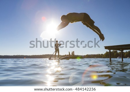 Similar – Image, Stock Photo Paddling on the Chiemsee