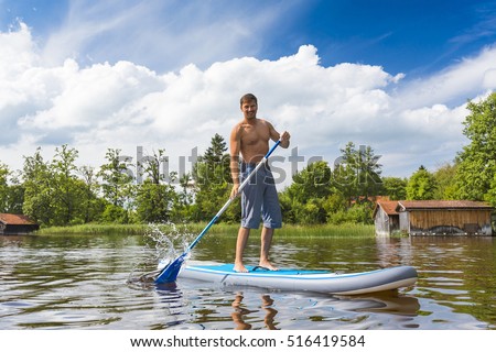 Similar – Image, Stock Photo Paddling on the Chiemsee
