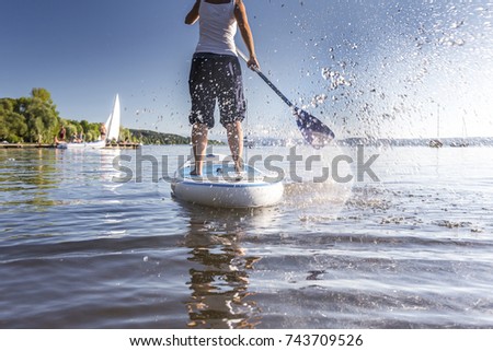 Similar – Image, Stock Photo Paddling on the Chiemsee