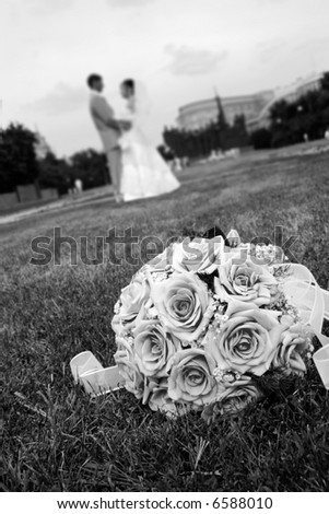 Wedding bouquet from roses on the lawn