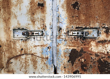 Rusty cargo container doors closeup