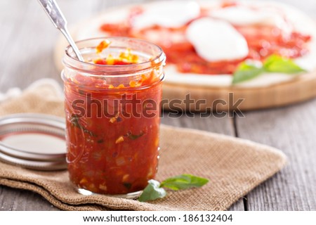 Pizza sauce in a jar - making pizza