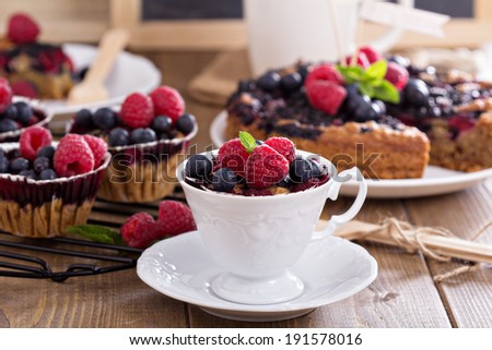 Berry muffin with oats served in a cup with fresh berries