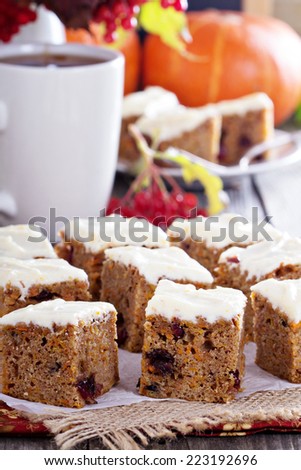 Pumpkin and carrot cake with cream cheese and orange glaze