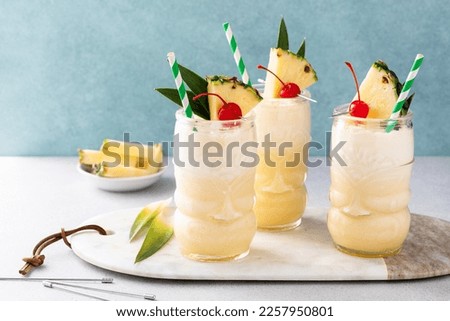 Similar – Image, Stock Photo Tiki glass of tropical cocktail with ice