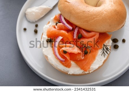 Similar – Image, Stock Photo Delicious salmon bagel on plate in kitchen