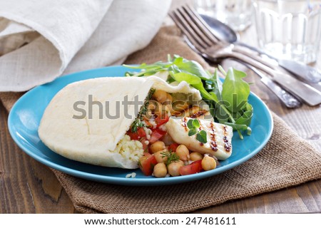 Pita bread stuffed with cheese, couscous and chickpeas