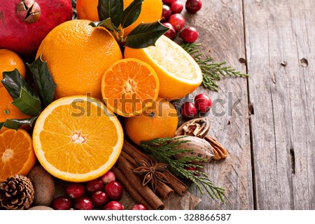 Image, Stock Photo Mandarine fruits and cinnamon sticks styled on blue cloth background, flat lay, winter theme