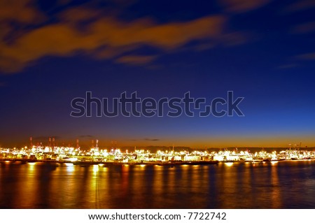 hamburg skyline. night skyline of the famous industrial harbour of hamburg, germany.