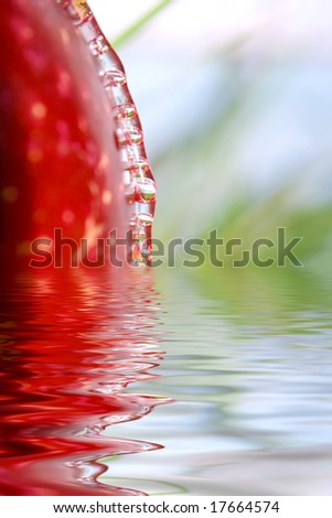 Play with fruit and water  Fresh apple with flowing water