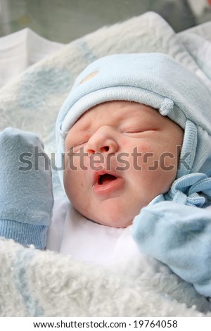 Sweet dream after childbirth, newborn baby in hospital.