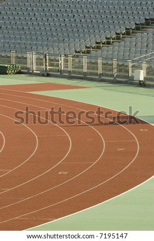 running tracks and empty seats in a stadium