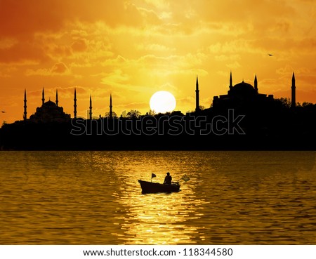Sunset over Istanbul Silhouette and the fishing boat