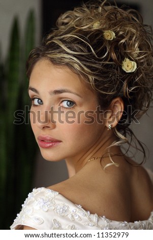 Beautiful woman A bride is the female participant in a wedding ceremony. The term bride comes from the Teutonic word for a cook. She is typically