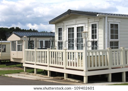 Exterior of modern caravan, mobile home or trailer in park, Generic image of one available for hire.